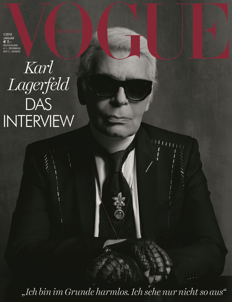 Cover of Vogue Germany Magazine, January 2018, featuring a portrait of Karl Lagerfeld with sunglasses and a black coat, title visible at the top.