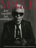 Cover of Vogue Germany Magazine, January 2018, featuring a portrait of Karl Lagerfeld with sunglasses and a black coat, title visible at the top.